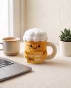 Crochet beer mug desk buddy on an office desk