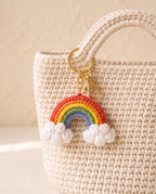 Crochet rainbow charm on a tote bag