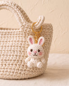 Crochet bunny charm on a tote bag