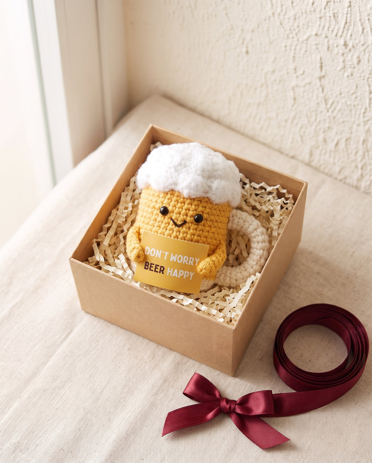 Crochet beer mug desk buddy in a kraft gift box