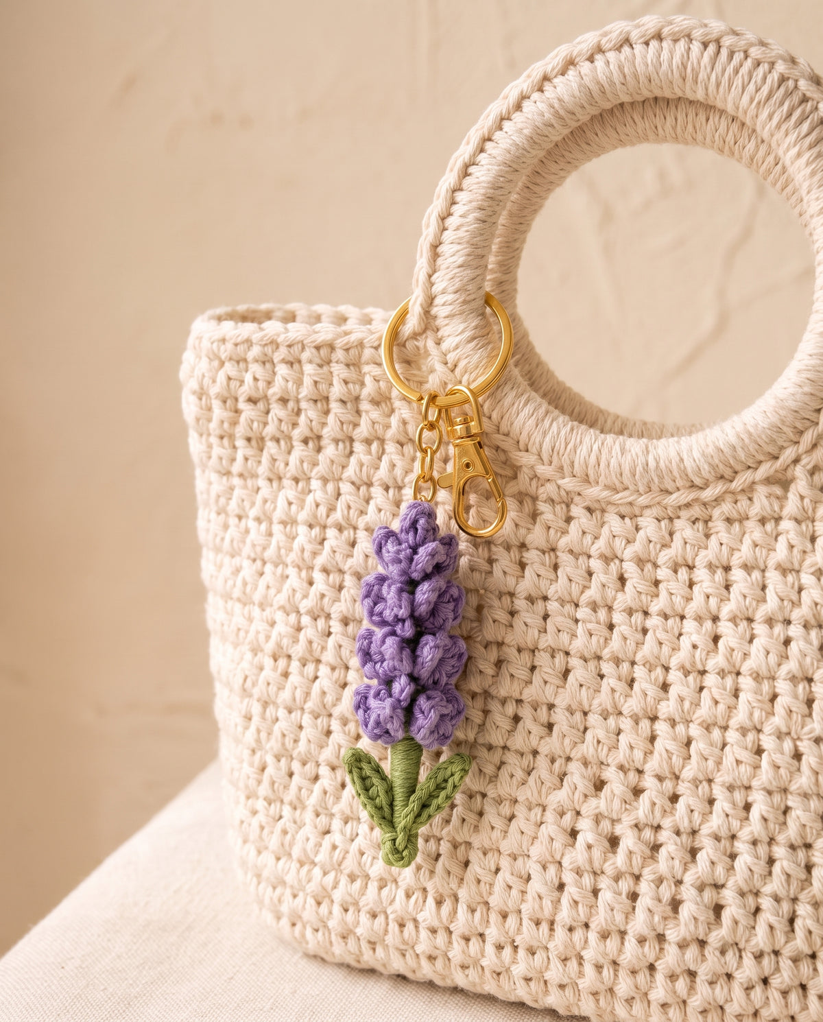 Crochet lavender charm on a tote bag