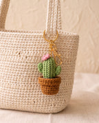 Crochet cactus charm on a tote bag