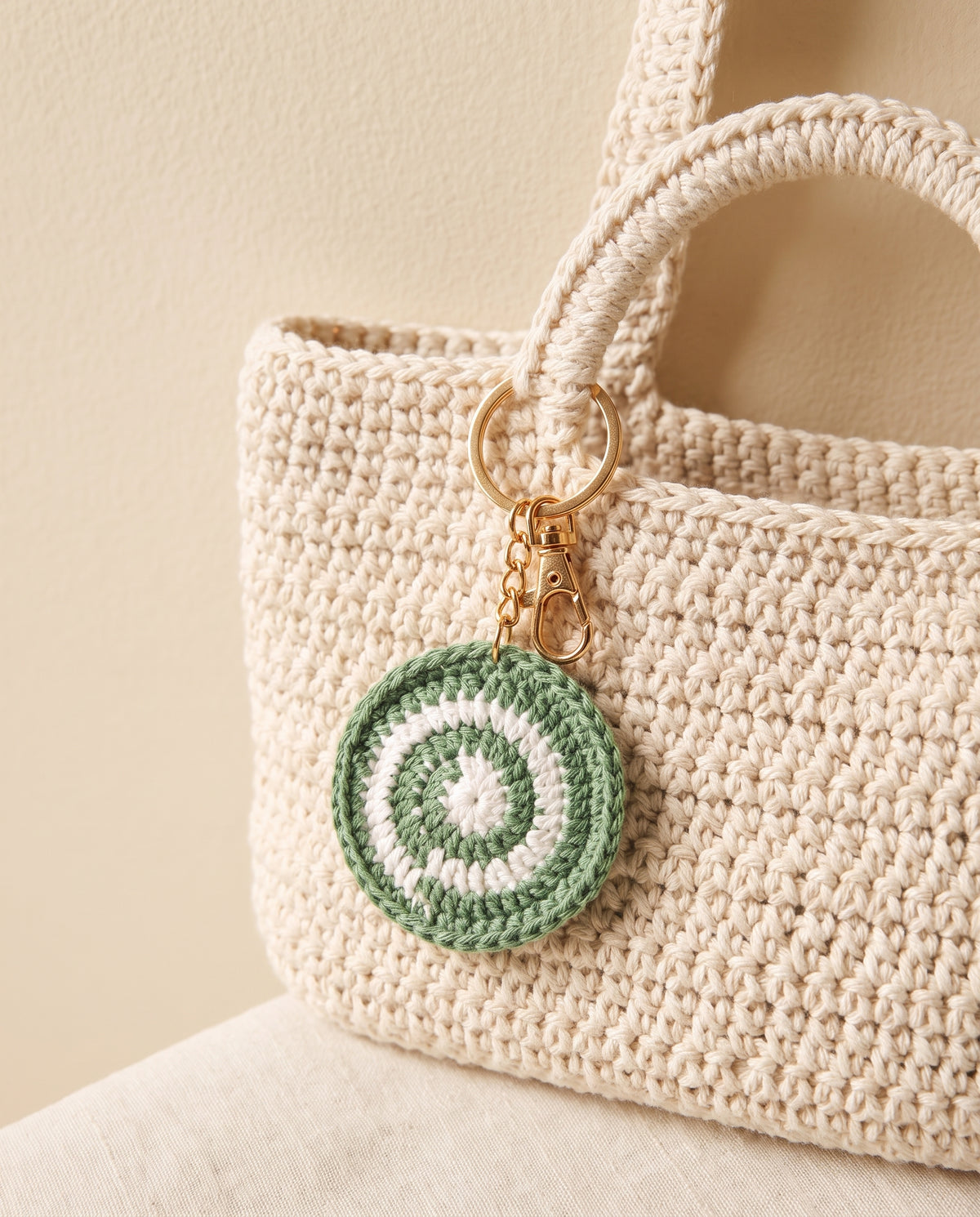 Crochet circle charm on a tote bag
