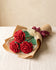 Wrapped bouquet of 3 crochet red roses