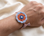 Blue and orange mandala crochet rakhi